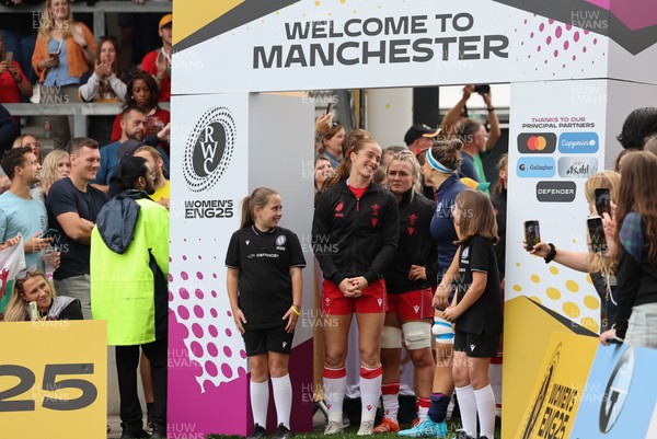 230825 - Wales v Scotland, Women’s Rugby World Cup - Lisa Neumann prepares to lead the team out on her 50th cap