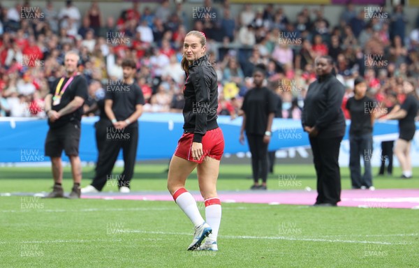 230825 - Wales v Scotland, Women’s Rugby World Cup - Lisa Neumann prepares to lead the team out on her 50th cap