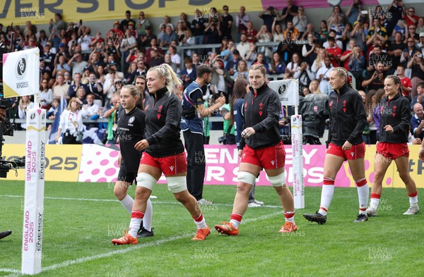 230825 - Wales v Scotland, Women’s Rugby World Cup - Alex Callender and Kate Williams lead the team out