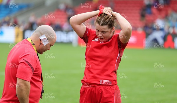 230825 - Wales v Scotland, Women’s Rugby World Cup - Kate Williams of Wales with Sean Lynn, Wales Women head coach