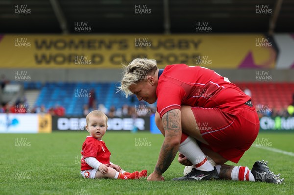 230825 - Wales v Scotland, Women’s Rugby World Cup - Donna Rose of Wales with daughter Margot at the end of the match