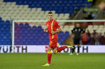 100913 -  Wales v Serbia - FIFA 2014 World Cup Qualifying Match -   Gareth Bale of Wales runs onto the pitch( c ) Huw Evans Agency
