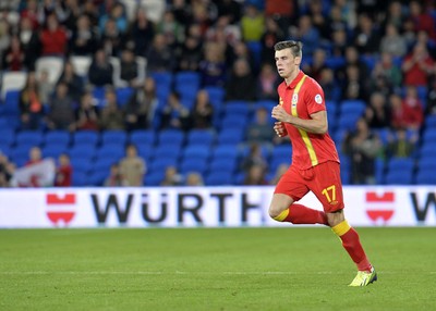 100913 -  Wales v Serbia - FIFA 2014 World Cup Qualifying Match -   Gareth Bale of Wales runs onto the pitch( c ) Huw Evans Agency