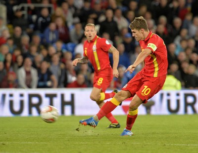 100913 -  Wales v Serbia - FIFA 2014 World Cup Qualifying Match -   Aaron Ramsey of Wales shoots at goal( c ) Huw Evans Agency