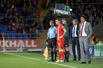 100913 -  Wales v Serbia - FIFA 2014 World Cup Qualifying Match -  Gareth Bale of Wales waits to step onto the pitch as a second half substitute( c ) Huw Evans Agency