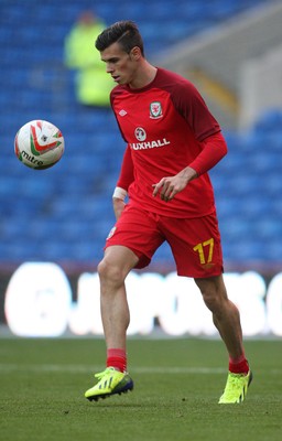 100913 - Wales v Serbia, FIFA 2014 World Cup Qualifying - Wales' Gareth Bale, who starts the match on the bench, warms up before the match(c) Huw Evans Picture Agency, Cardiff