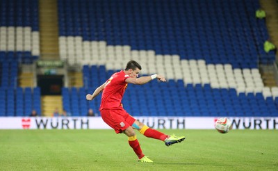 100913 - Wales v Serbia, FIFA 2014 World Cup Qualifying - Wales' Gareth Bale shoots at goal in front of an empty stand- (c) Huw Evans Picture Agency, Cardiff