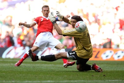 07.10.06...Wales v Slovakia, Euro 2008 Qualifying Match, Cardiff Wales' Craig Bellamy beats Kamil Contofalsky to put the ball in the net only for the goal to be disallowed for offside 