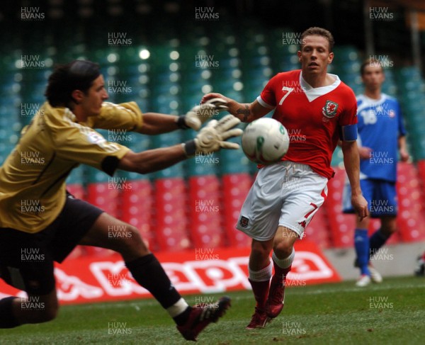 07.10.06 - Euro 2008 Qualifying Match, Group D Wales v Slovakia Wales Craig Bellamy tries to beat 'keeper Kamil Contofalsky 