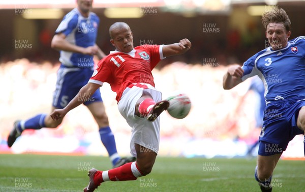 07.10.06...Wales v Slovakia, Euro 2008 Qualifying Match, Cardiff Wales' Robert Earnshaw flies in to fire shot at goal 