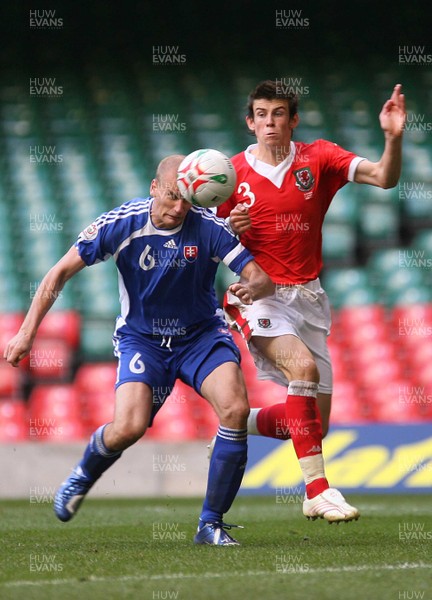 07.10.06...Wales v Slovakia, Euro 2008 Qualifying Match, Cardiff Wales' Gareth Bale loses out to Miroslav Karhan  