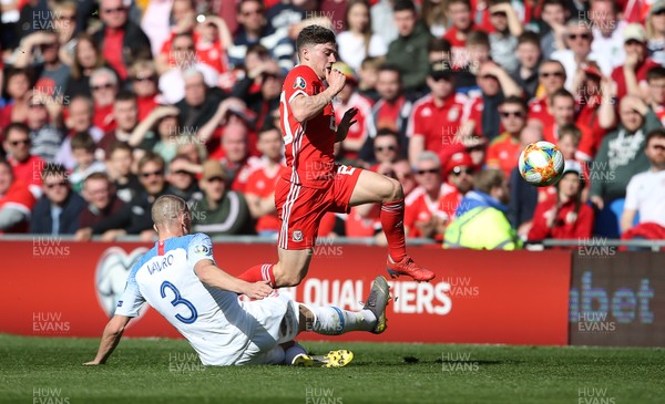 240319 - Wales v Slovakia - UEFA EURO 2020 Qualifier - Daniel James of Wales is tackled by Denis Varro of Slovakia