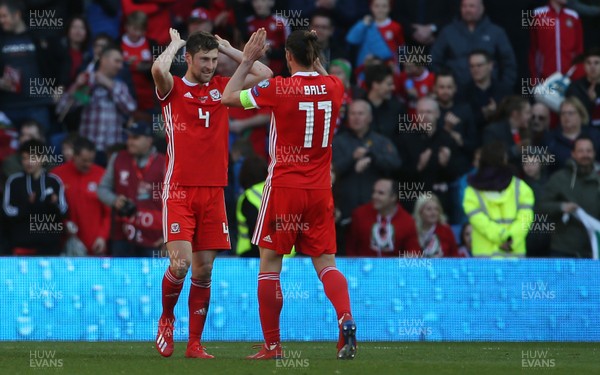 240319 - Wales v Slovakia - UEFA EURO 2020 Qualifier - Ben Davies and Gareth Bale of Wales celebrate at full time