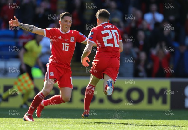 240319 - Wales v Slovakia, UEFA Euro 2020 Qualifier - Harry Wilson of Wales celebrates as Daniel James of Wales races away after he shoots to score goal