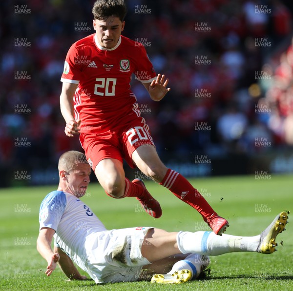 240319 - Wales v Slovakia, UEFA Euro 2020 Qualifier - Daniel James of Wales is brought down by Denis Varro of Slovakia