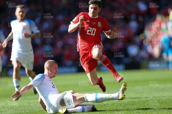 240319 - Wales v Slovakia, UEFA Euro 2020 Qualifier - Daniel James of Wales is brought down by Denis Varro of Slovakia