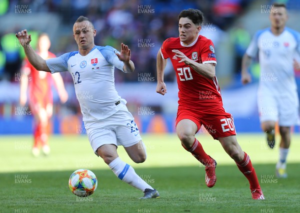 240319 - Wales v Slovakia, UEFA Euro 2020 Qualifier - Daniel James of Wales takes on Stanislav Lobotka of Slovakia