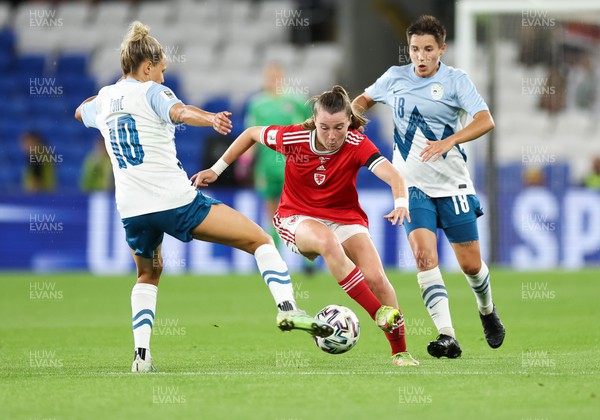 060922 - Wales v Slovenia, FIFA Women's World Cup 2023 Qualifier - Carrie Jones of Wales gets past Dominika Conc of Slovenia