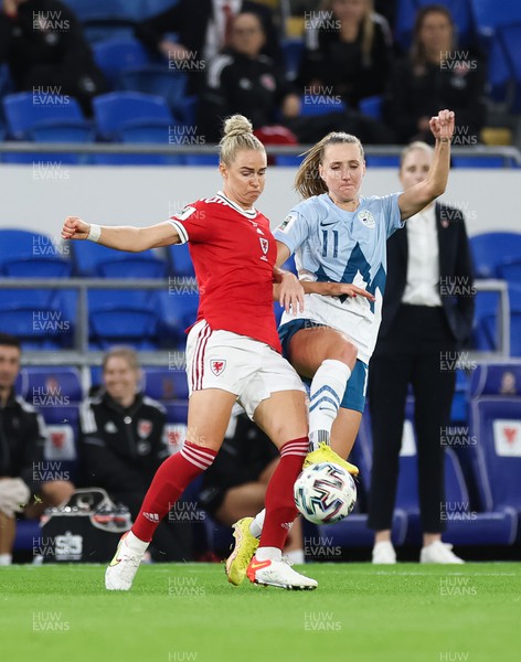 060922 - Wales v Slovenia, FIFA Women's World Cup 2023 Qualifier - Rhiannon Roberts of Wales and Izabela Krizaj of Slovenia compete for the ball