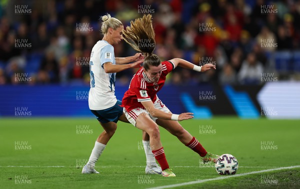 060922 - Wales v Slovenia, FIFA Women's World Cup 2023 Qualifier - Carrie Jones of Wales and Kaja Erzen of Slovenia compete for the ball