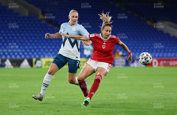 060922 - Wales v Slovenia, FIFA Women's World Cup 2023 Qualifier - Kayleigh Green of Wales holds off Lana Golob of Slovenia