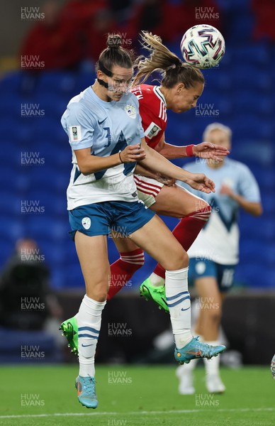 060922 - Wales v Slovenia, FIFA Women's World Cup 2023 Qualifier - Kayleigh Green of Wales challenges Sara Agrez of Slovenia for the ball