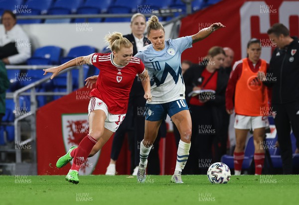 060922 - Wales v Slovenia, FIFA Women's World Cup 2023 Qualifier - Ceri Holland of Wales gets away from Dominika Conc of Slovenia