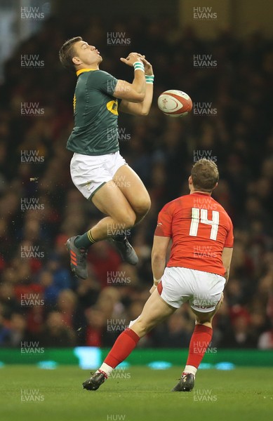 021217 - Wales v South Africa, 2017 Under Armour Autumn Series - Handre Pollard of South Africa loses the ball under pressure from Hallam Amos of Wales
