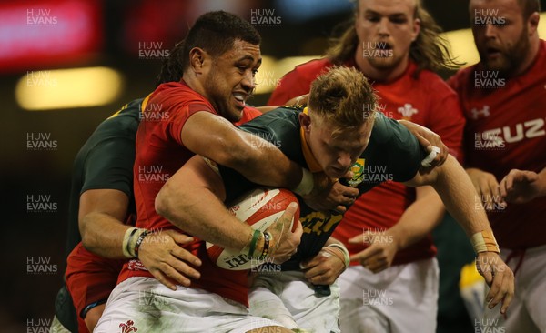 021217 - Wales v South Africa, 2017 Under Armour Autumn Series - Dan du Preez of South Africa is tackled by Taulupe Faletau of Wales