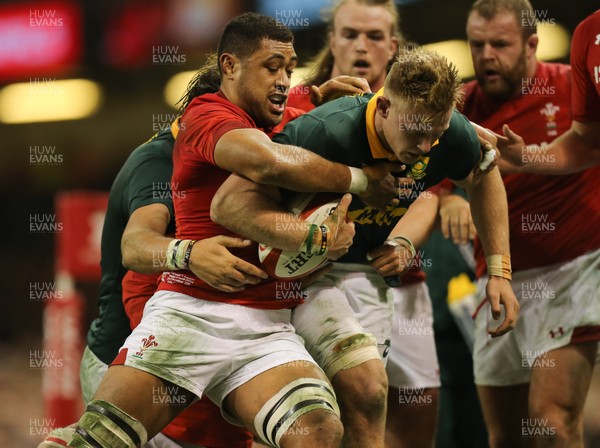 021217 - Wales v South Africa, 2017 Under Armour Autumn Series - Dan du Preez of South Africa is tackled by Taulupe Faletau of Wales