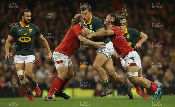 021217 - Wales v South Africa, 2017 Under Armour Autumn Series - Handre Pollard of South Africa is tackled by Josh Navidi of Wales  and Kristian Dacey of Wales