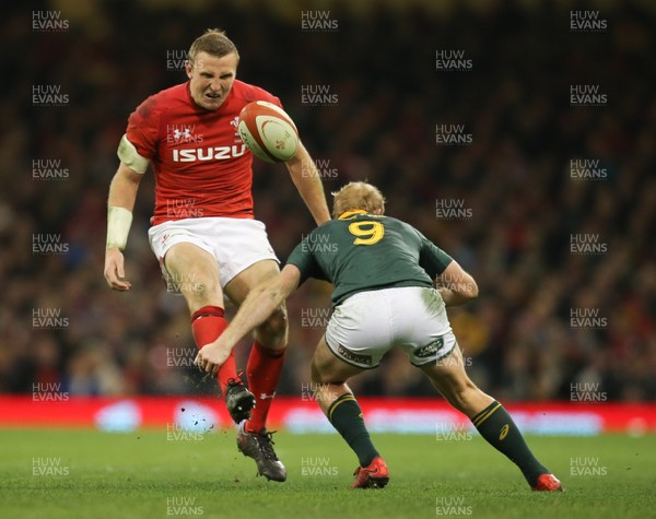 021217 - Wales v South Africa, 2017 Under Armour Autumn Series - Hadleigh Parkes of Wales kicks past Ross Cronje of South Africa