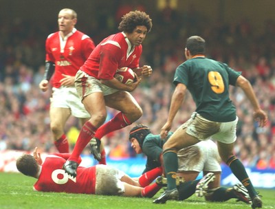 06.11.04 Wales v S.Africa,Cardiff  Wales Colin Charvis takes on Fourie Du Preez  Huw Evans,Cardiff