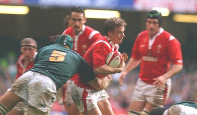 06.11.04 Wales v S.Africa,Cardiff  Wales Dwayne Peel is tackled by Victor Matfield  Huw Evans,Cardiff