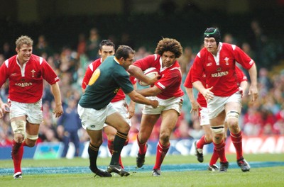 6-11-04. Wales v South Africa. Autumn International.  Wales' Colin Charvis tries to get past Fourie De Preez.  