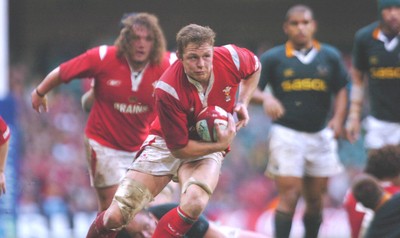 6-11-04. Wales v South Africa. Autumn International.  Wales' Dafydd Jones races away.  