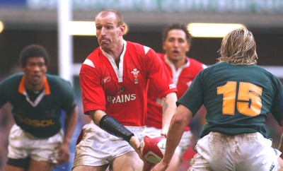 06.11.05  Wales v S.Africa,Cardiff  Wales Gareth Thomas takes on Percy Montgomery  