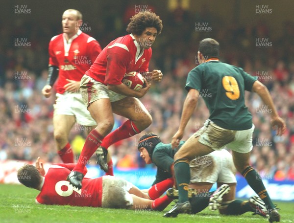 06.11.04 Wales v S.Africa,Cardiff  Wales Colin Charvis takes on Fourie Du Preez  Huw Evans,Cardiff