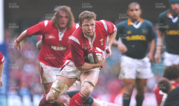 6-11-04. Wales v South Africa. Autumn International.  Wales' Dafydd Jones races away.  