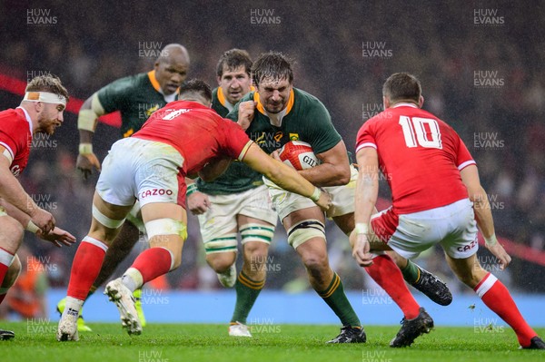 061121 - Wales v South Africa - Autumn Nations Series - Eben Etzebeth of South Africa is tackled by Taine Basham of Wales