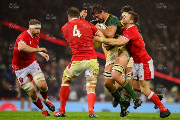 061121 - Wales v South Africa - Autumn Nations Series -  Eben Etzebeth of South Africa is tackled By Will Rowlands of Wales and Dan Biggar of Wales