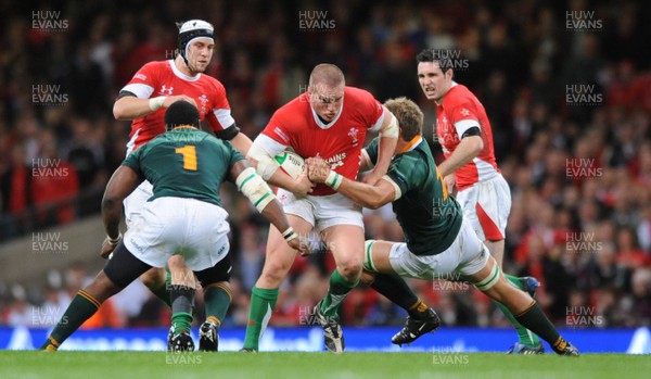 08.11.08 - Wales v South Africa - Invesco Perpetual Series 2008 - Wales' Gethin Jenkins is tackled by South Africa's Bismarck du Plessis. 