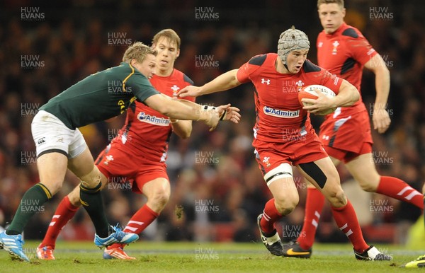 091113 - Wales v South Africa - Dove Men+Care Series -Jonathan Davies of Wales is tackled by Morne Steyn of South Africa