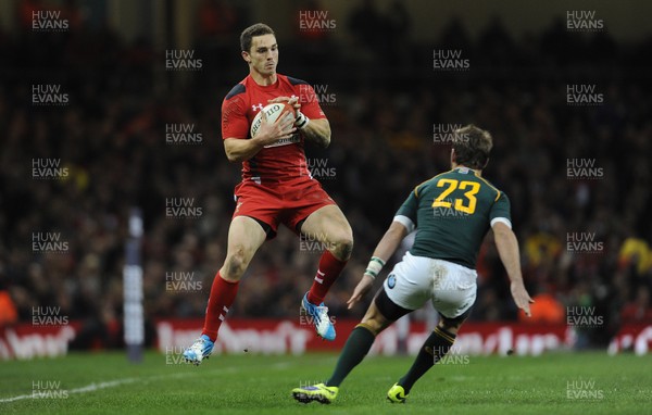 091113 - Wales v South Africa - Dove Men+Care Series -George North of Wales is tackled by Willie le Roux of South Africa