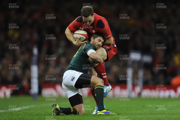 091113 - Wales v South Africa - Dove Men+Care Series -George North of Wales is tackled by Willie le Roux of South Africa