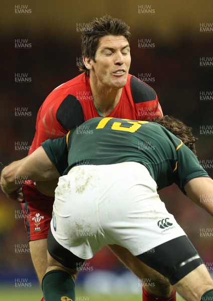 091113 - Wales v South Africa, Dove Mens Autumn Series - Wales' James Hook takes on South Africa's Jaque Fourie