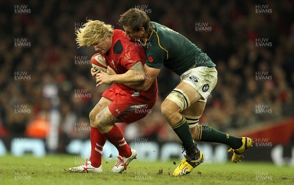 091113  - Wales v South Africa - 2013 Dove Men Series - Richard Hibbard of Wales is tackled by Eben Etzebeth of South Africa