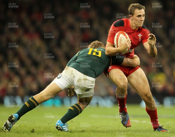 091113  - Wales v South Africa - 2013 Dove Men Series - Ashley Beck of Wales is tackled by Pat Lambie of South Africa 