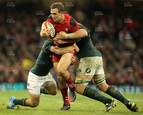 091113  - Wales v South Africa - 2013 Dove Men Series - Ashley Beck of Wales is tackled by Pat Lambie and Flip Van Der Merwe of South Africa