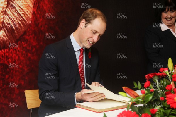 091113  - HRH Duke of Cambridge signs the visitors book during a visit to the Millennium Stadium before the game Wales v South Africa